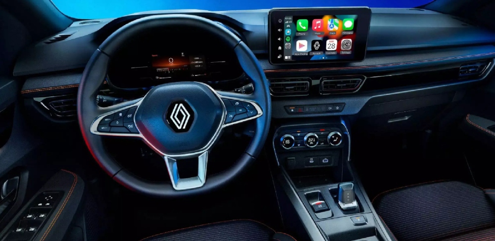 Vista interior de Renault Kardian con volante multifunción y caja de cambios automática.